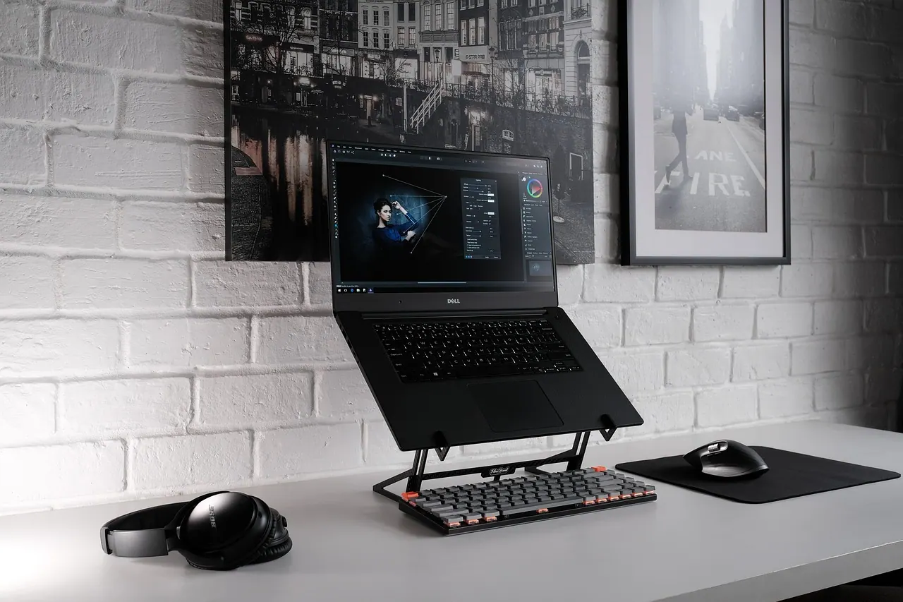 laptop, desk, office, workspace, office space, digital nomad, laptop stand, laptop riser, mechanical keyboard, headphones, computer mouse, mouse pad, work, desk setup, remote work,. How to increase virtual assistant agency client renewals