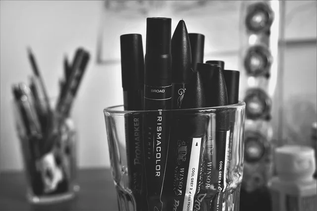 black and white, glass, pens, marker, school, office, gray office, gray school. AI task automation for a virtual assistant agency: three tools compared