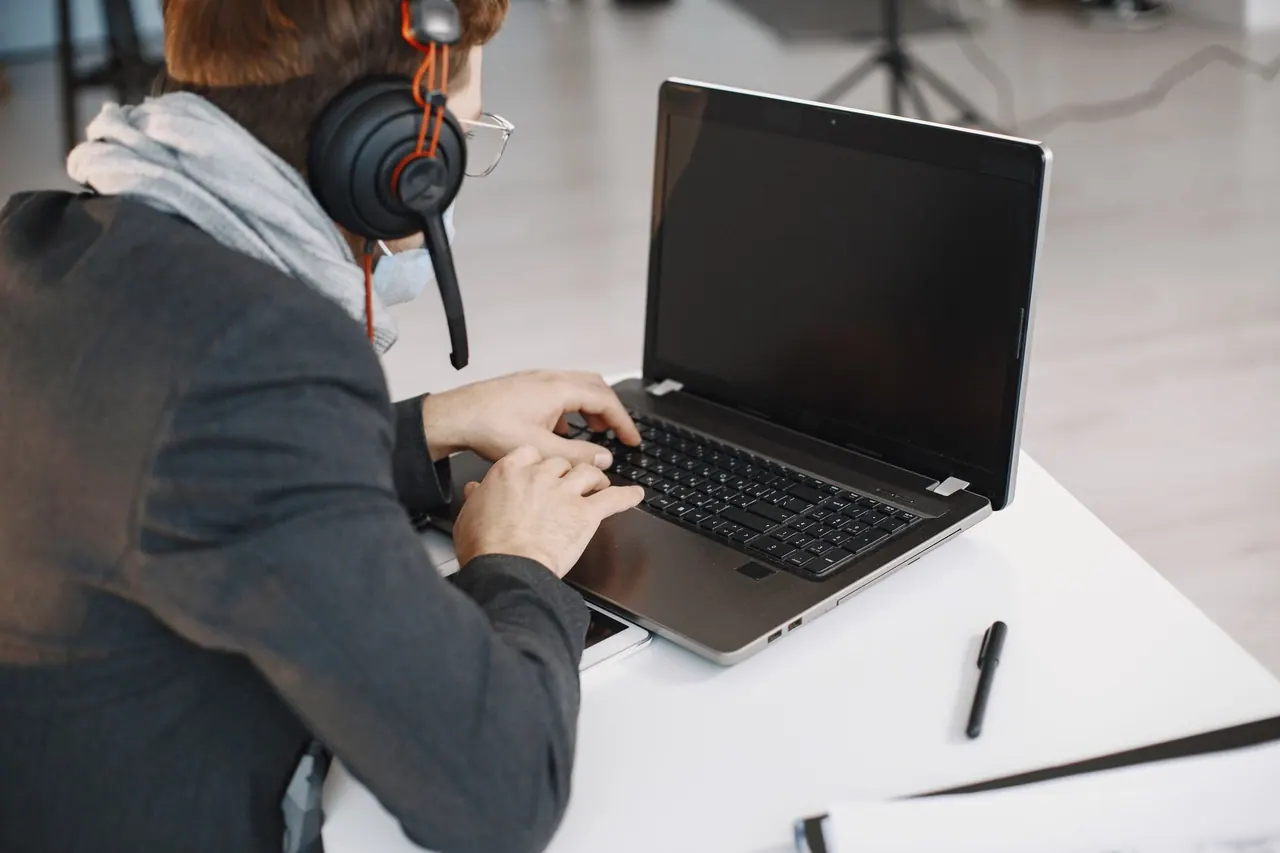 online, meeting, virtual, skype, zoom, video, conference, videoconference, webinar, remote, working, work, from, home, computer, businesswoman, pointing, couch, laptop, blue comput